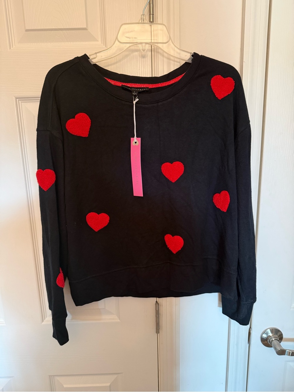 Jane and Delancey Black Crewneck Sweater with Red Heart Appliqués